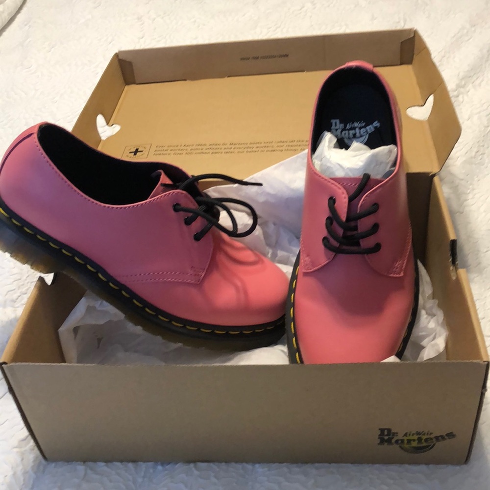 Dr Martens boots.  Pink, brand new.